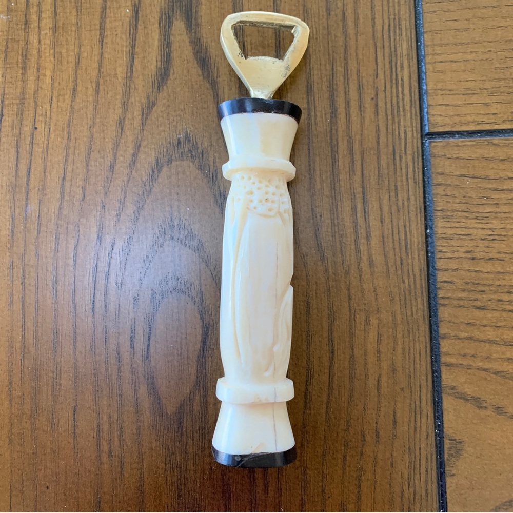 Bone carved bottle opener